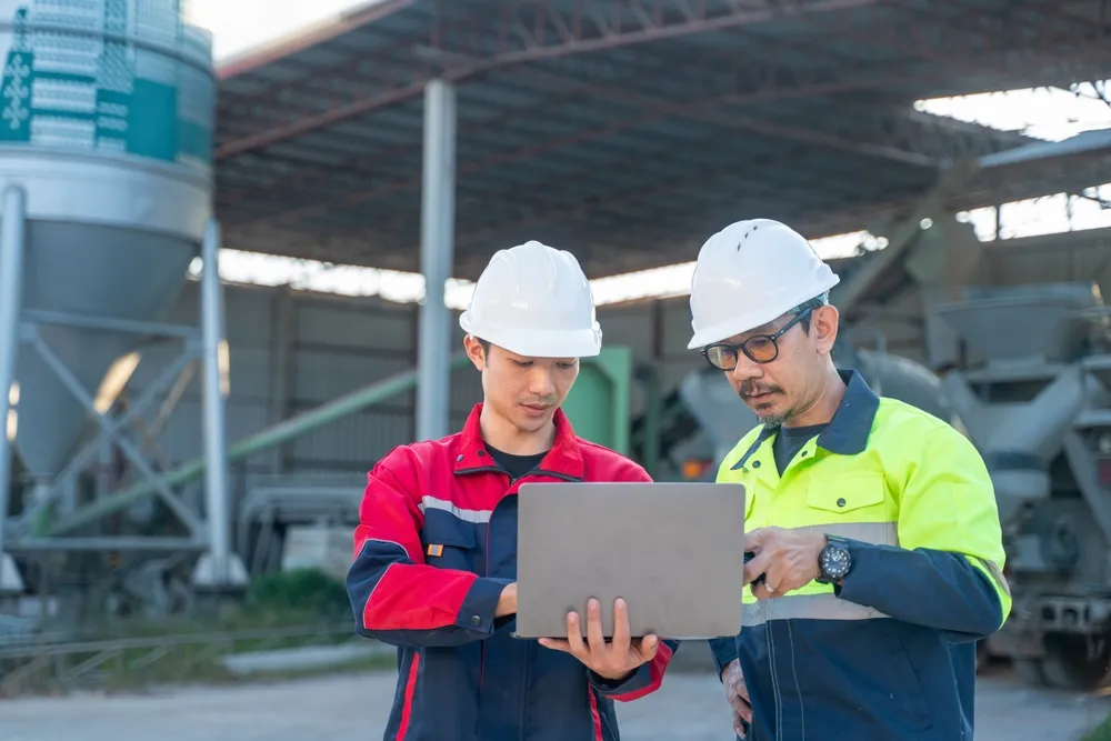HSE and safety managers reviewing site conditions