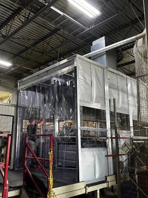Industrial acoustic enclosure installed on a production line